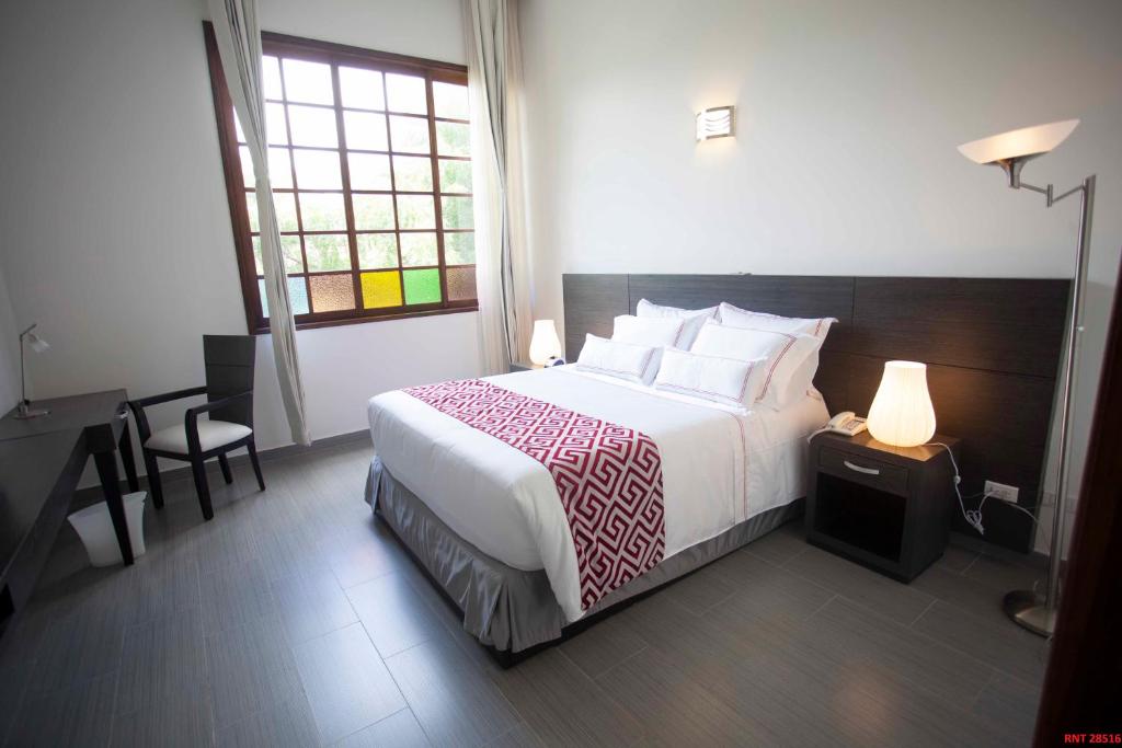 Postel nebo postele na pokoji v ubytování Hotel Union