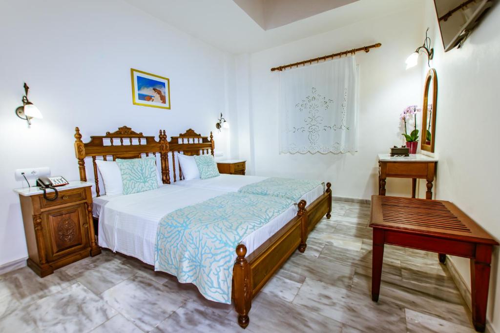 Postel nebo postele na pokoji v ubytování Anais Collection Hotels & Suites