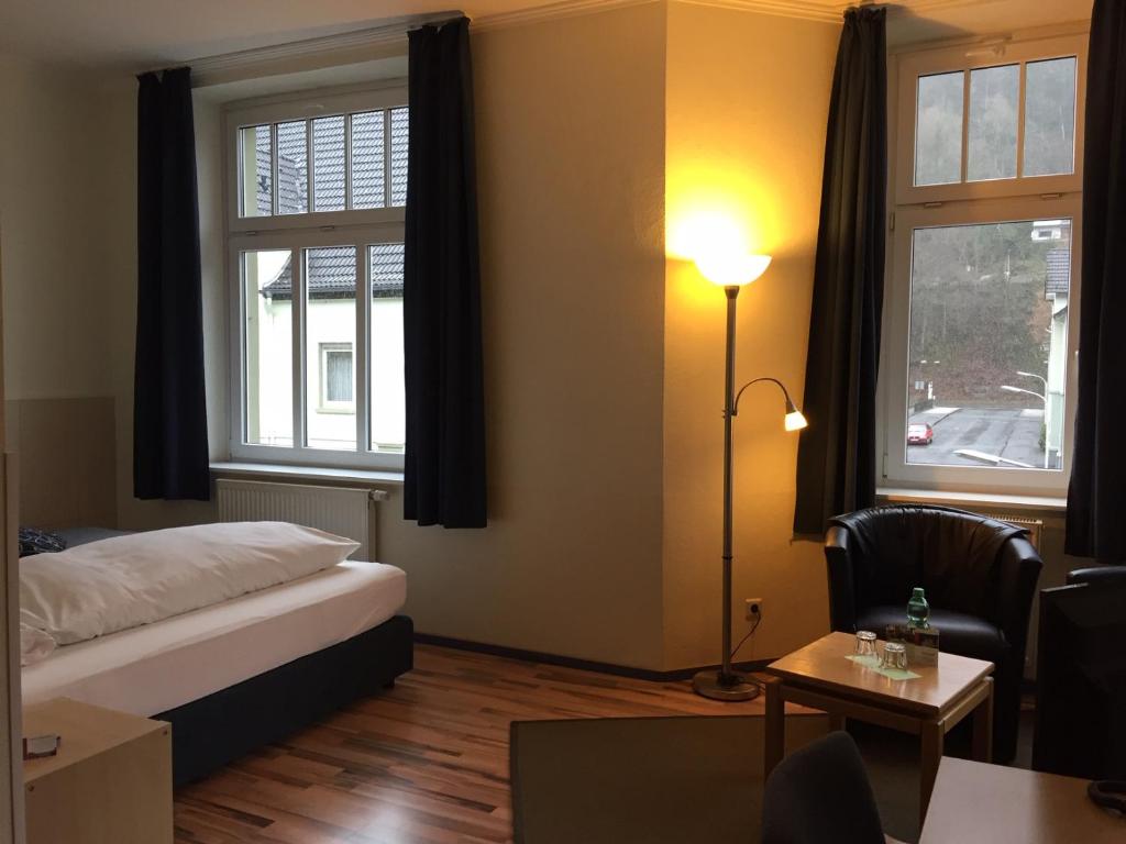 Postel nebo postele na pokoji v ubytování Hotel Weidenhof