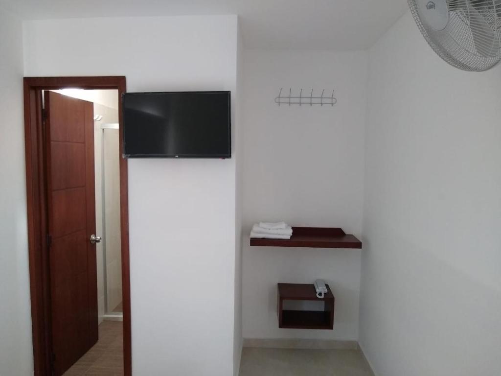 TV a/nebo společenská místnost v ubytování Hotel Don Luis