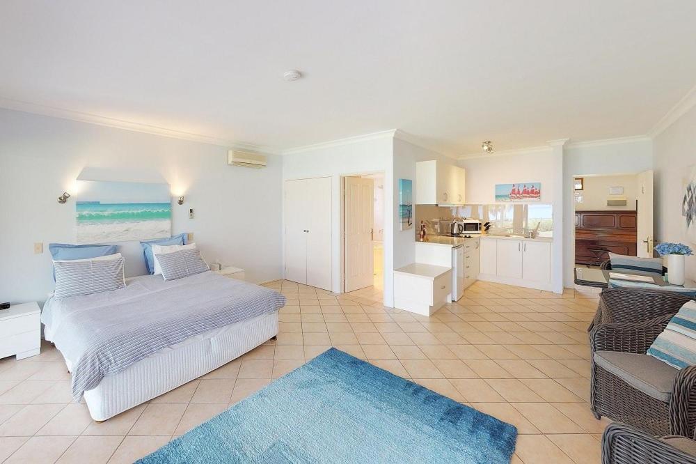 Kuchyň nebo kuchyňský kout v ubytování Paradise Beach Apartments