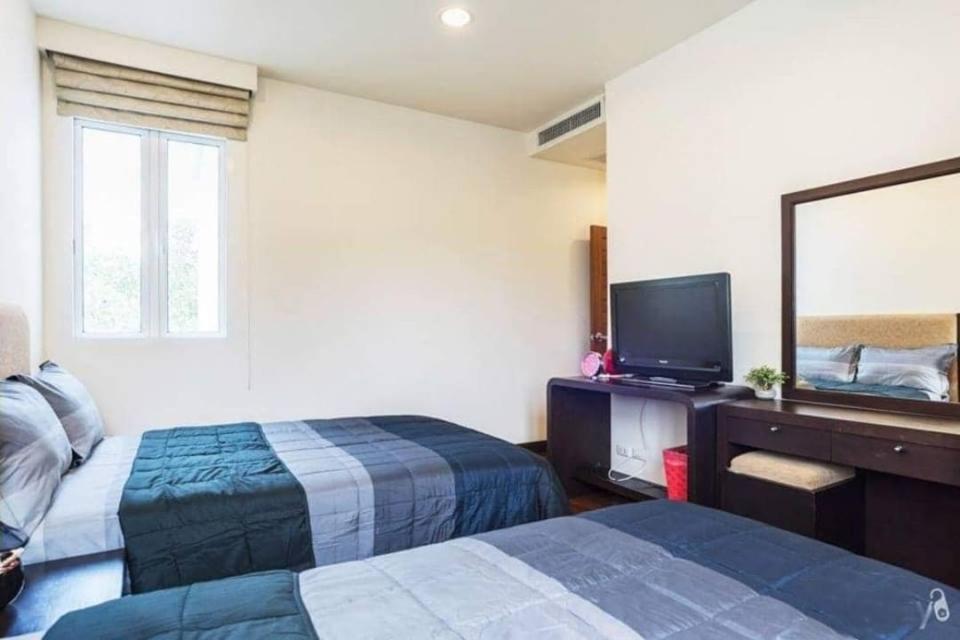 Postel nebo postele na pokoji v ubytování Blue Lagoon Hua Hin - Sea Renity Villa