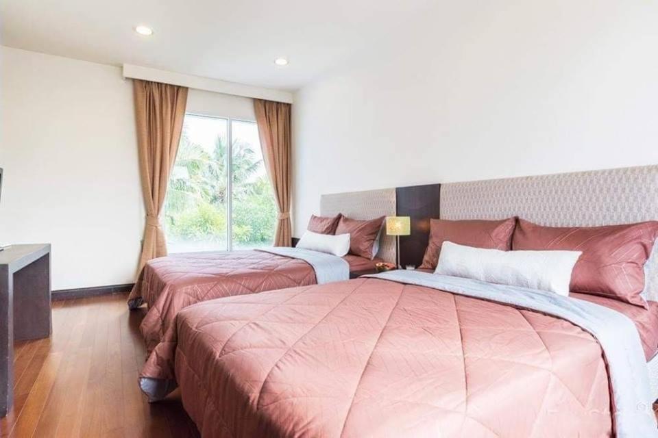 Postel nebo postele na pokoji v ubytování Blue Lagoon Hua Hin - Sea Renity Villa