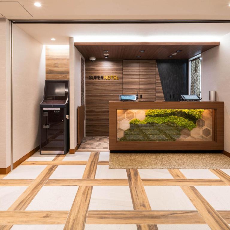 Kuchyň nebo kuchyňský kout v ubytování Super Hotel Nagano Iida Inter