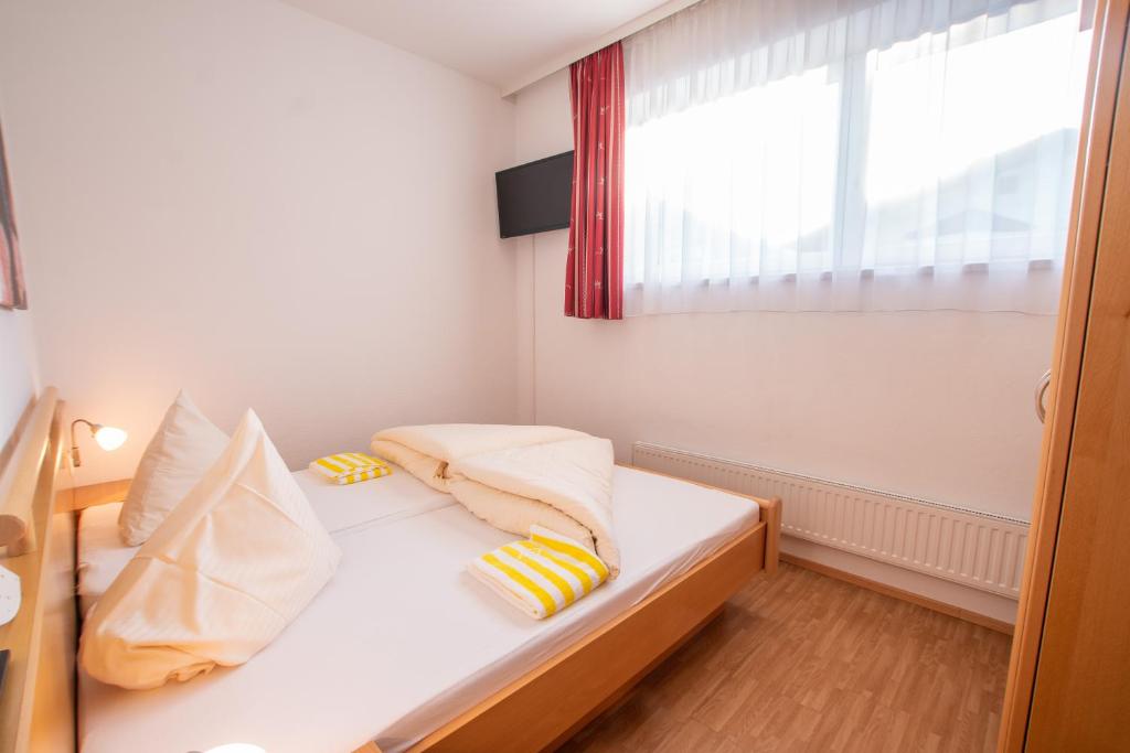 Posteľ alebo postele v izbe v ubytovaní Sonnseitn Appartements