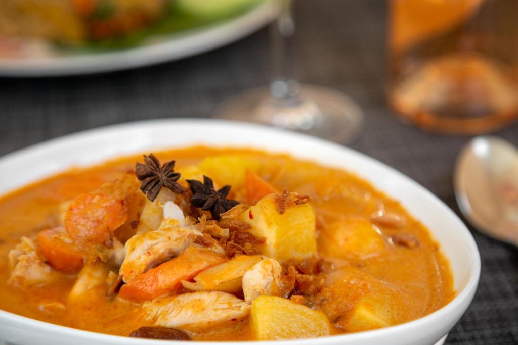 a bowl of soup on a table at Hotel Waldegg - Adults only in Engelberg
