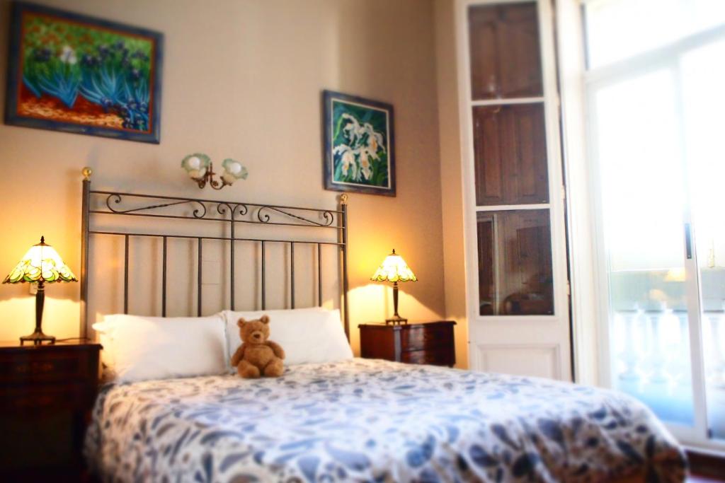 Postel nebo postele na pokoji v ubytování Privat Hotel Liberty Sitges