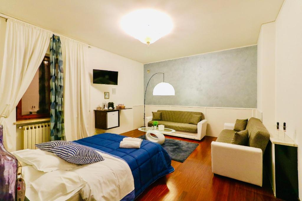 Postel nebo postele na pokoji v ubytování Vitti's Home Verona