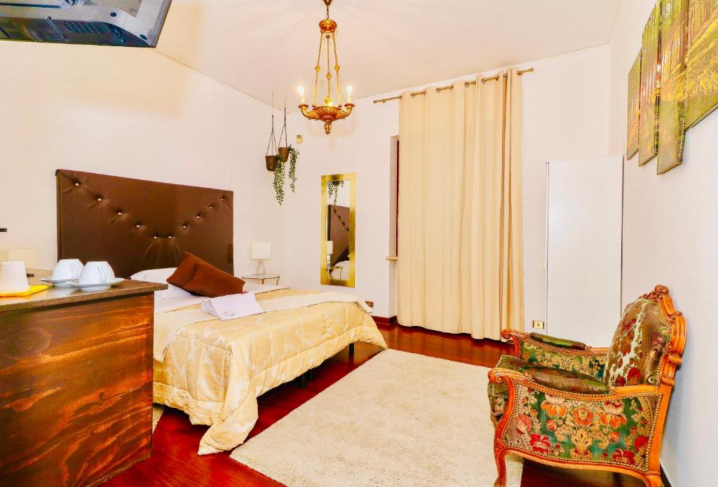 Postel nebo postele na pokoji v ubytování Vitti's Home Verona