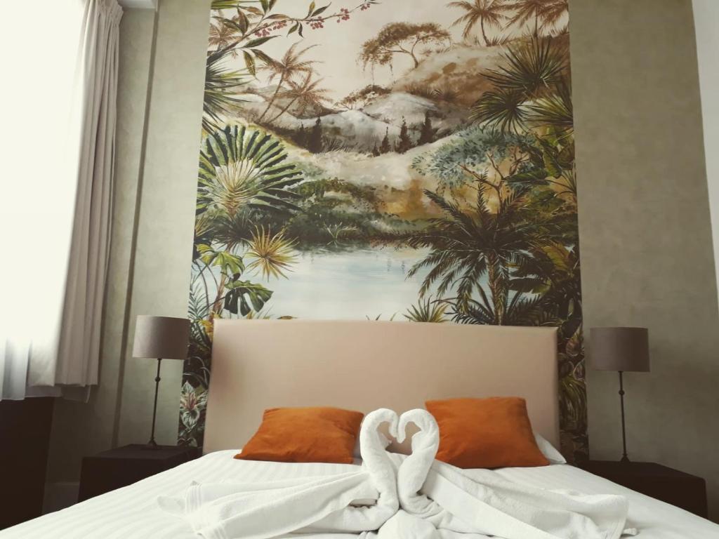 Postel nebo postele na pokoji v ubytování Hotel Zilt