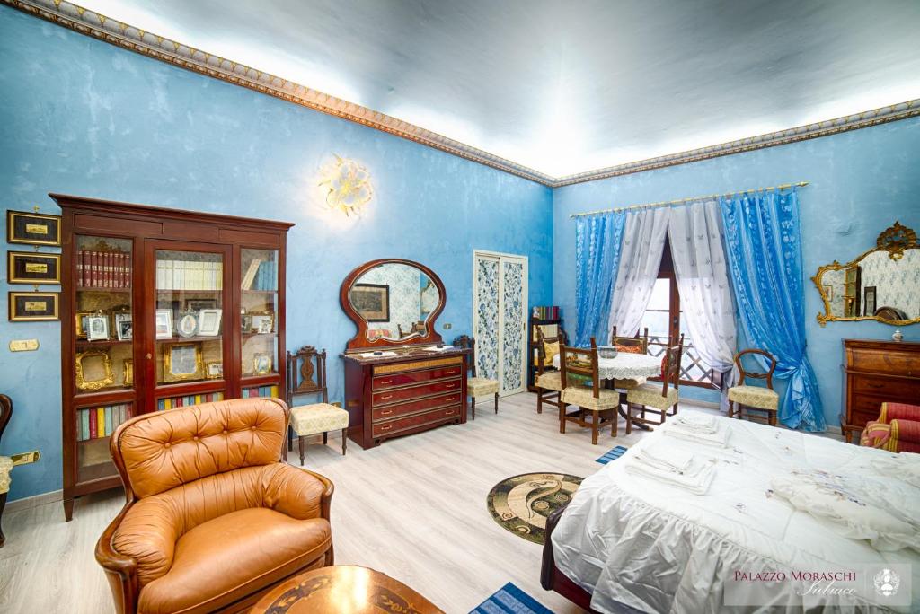 A bed or beds in a room at Palazzo Moraschi Subiaco