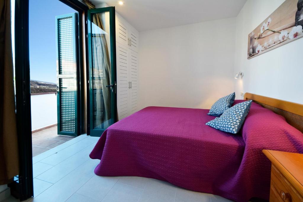 Postel nebo postele na pokoji v ubytování Taucho - Vivienda Vacacional