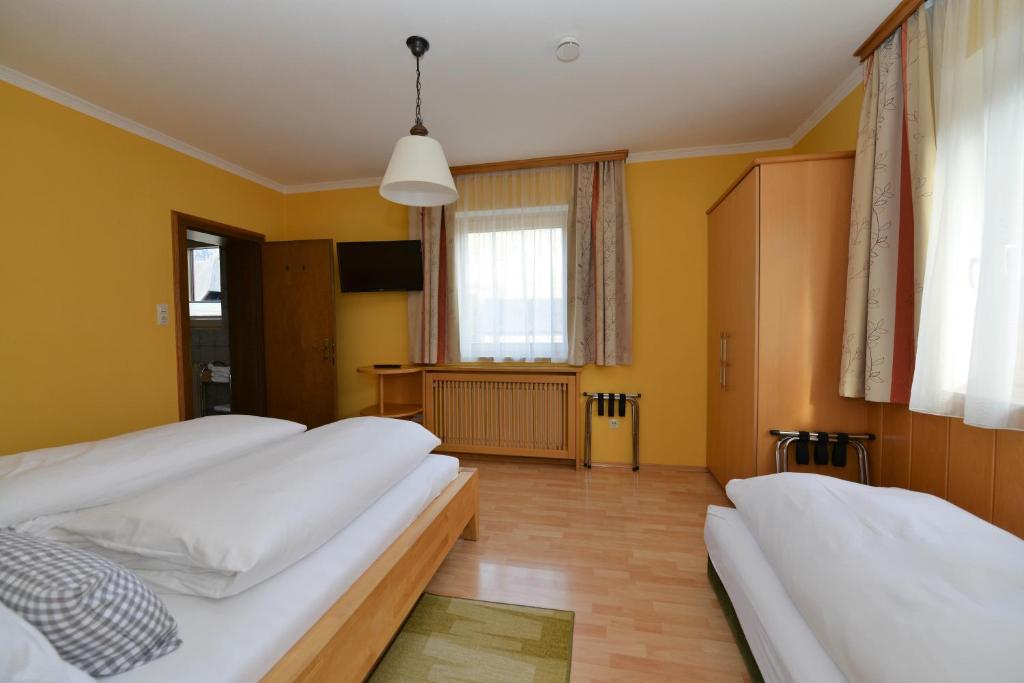 Postel nebo postele na pokoji v ubytování Haus Miriam