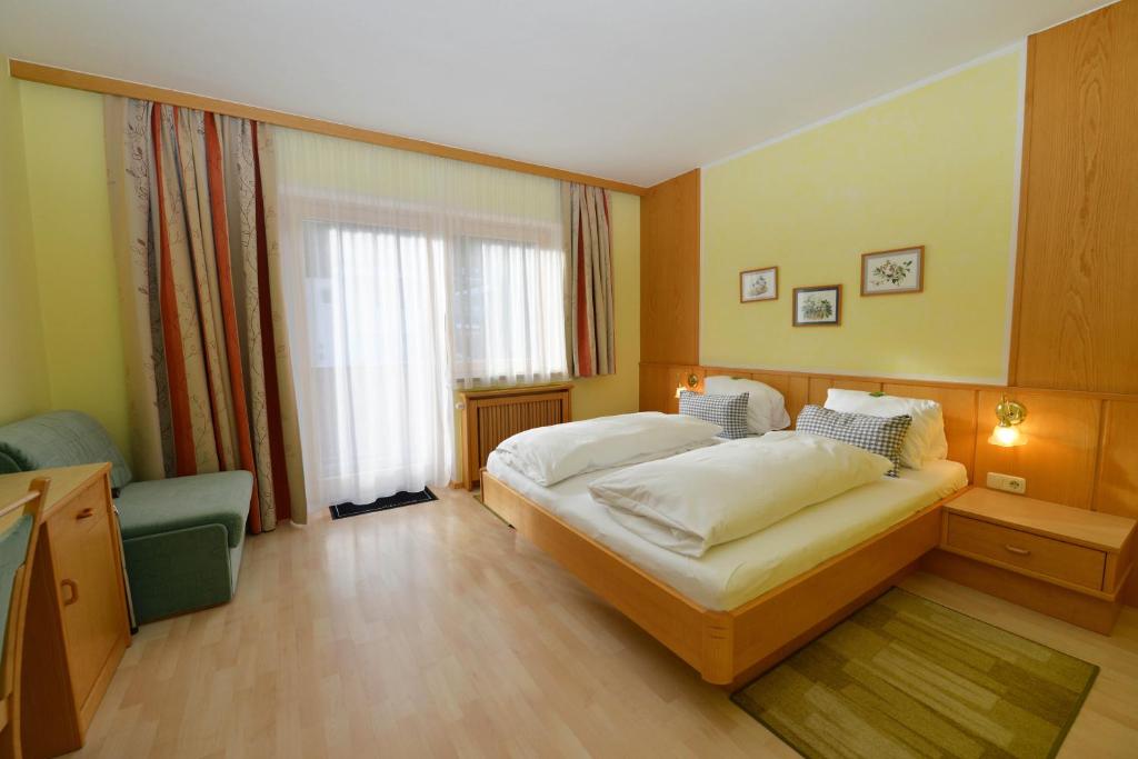 Postel nebo postele na pokoji v ubytování Haus Miriam