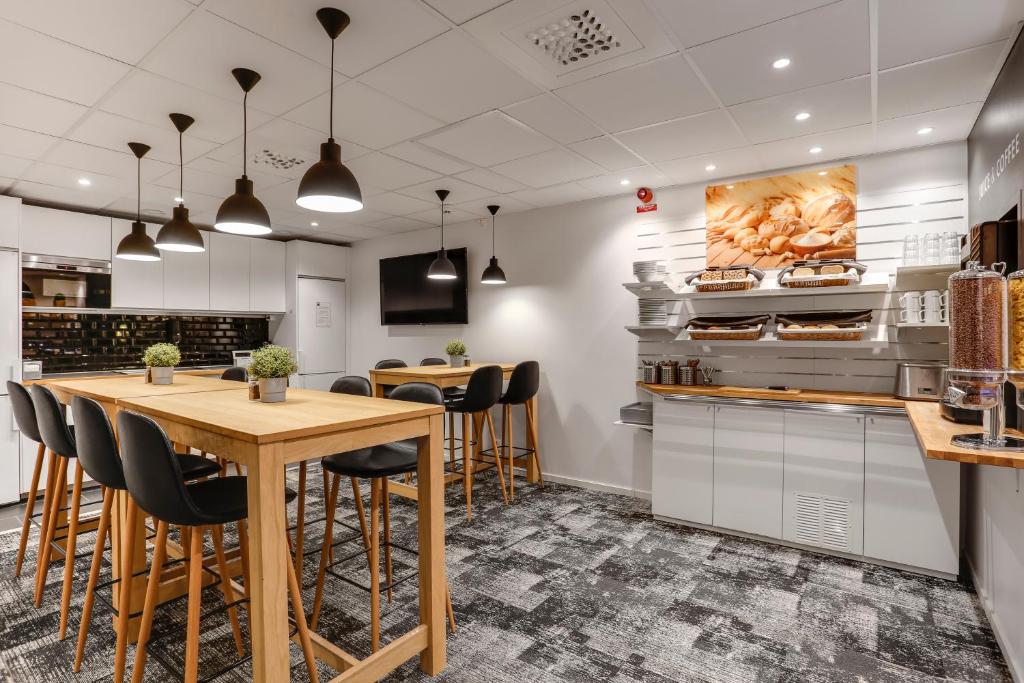 Kuchyň nebo kuchyňský kout v ubytování Hotel Vindeus