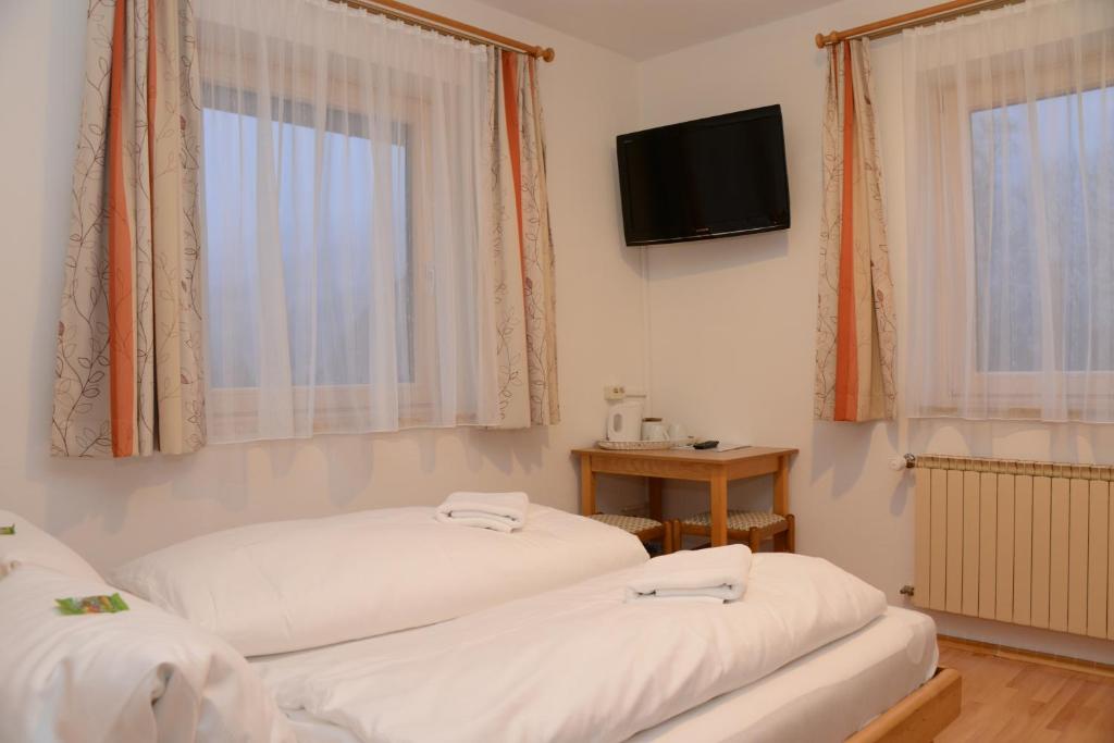 Postel nebo postele na pokoji v ubytování Haus Miriam