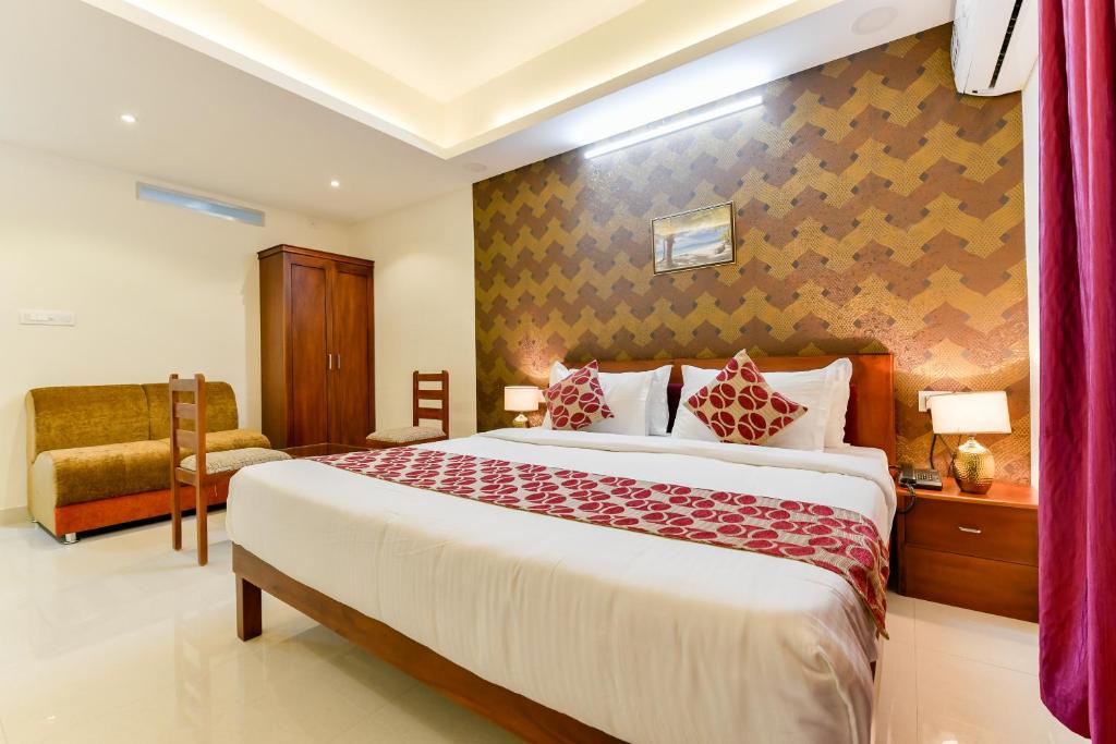 Postel nebo postele na pokoji v ubytování Hotel Hilite Inn