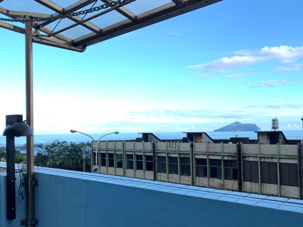 a view from the balcony of a building at Jia Ying Beach Resort B&amp;B in Toucheng