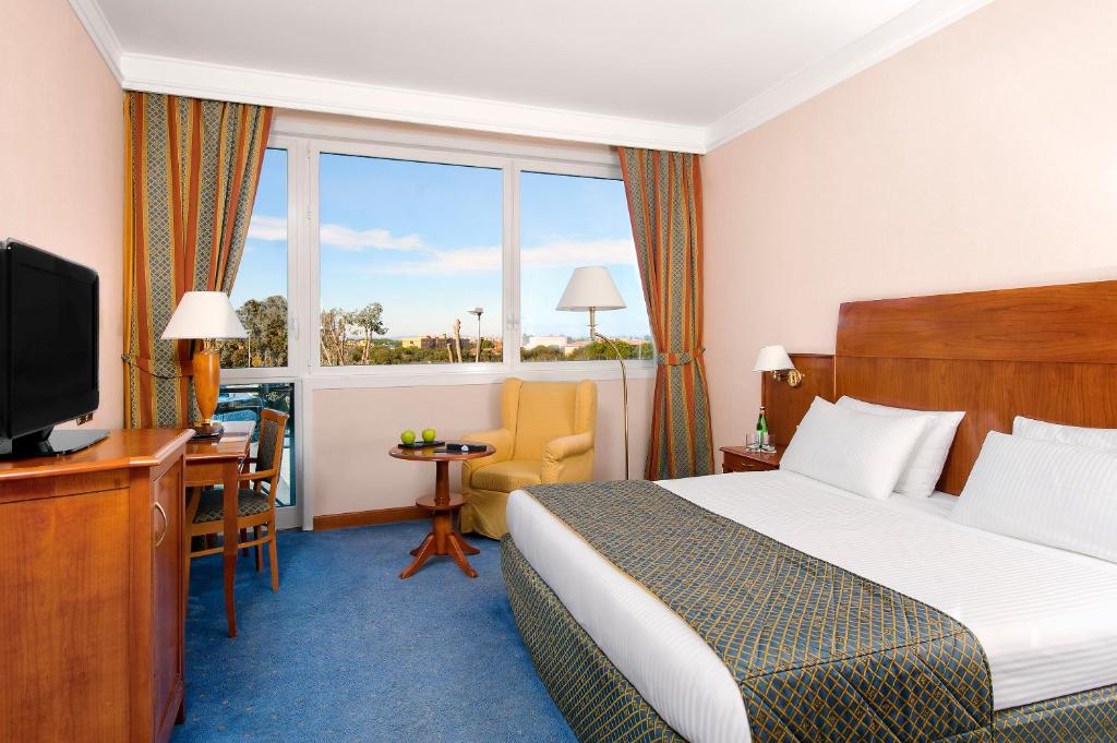 TV a/nebo společenská místnost v ubytování Hotel Roma Aurelia Antica