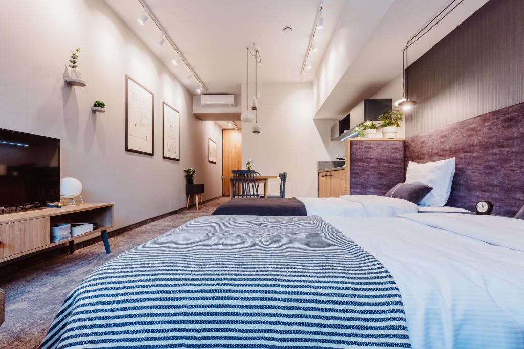 Posteľ alebo postele v izbe v ubytovaní Mosquito Silesia Apartments