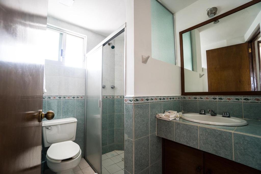 Koupelna v ubytování Hotel Suites Regina