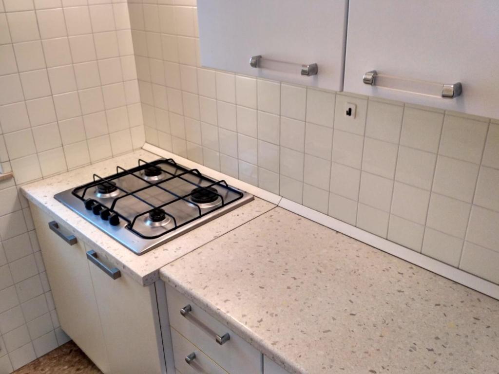 A kitchen or kitchenette at Condominio VILLA CHIARA