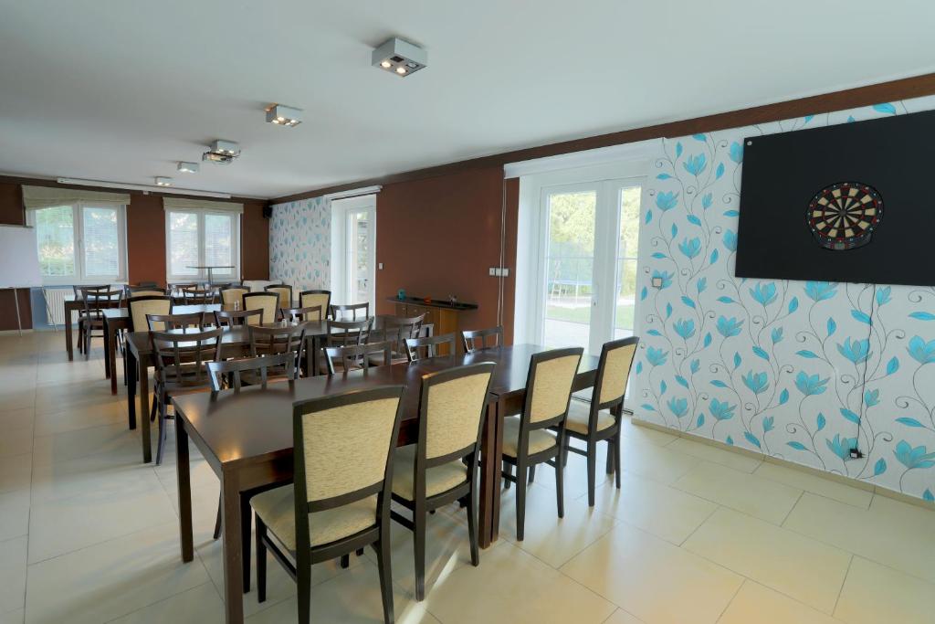 TV a/nebo společenská místnost v ubytování Hotel BRADA
