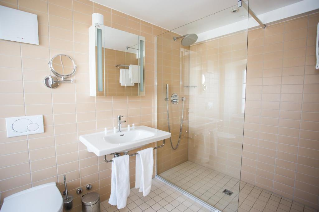 Vannituba majutusasutuses Guest House Le Charlot