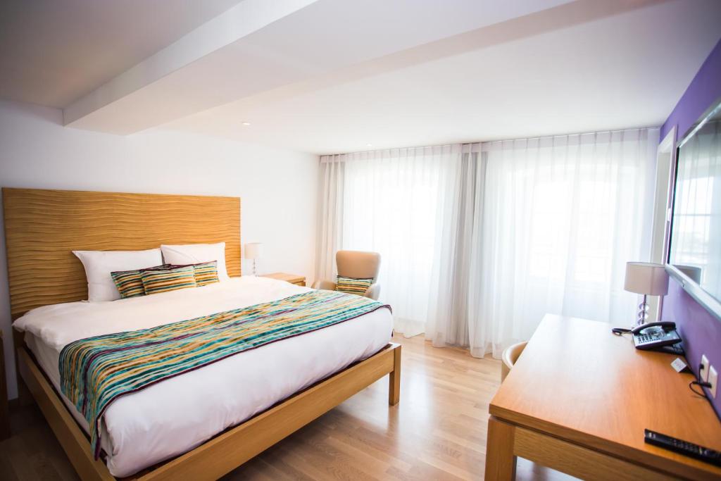 Voodi või voodid majutusasutuse Guest House Le Charlot toas