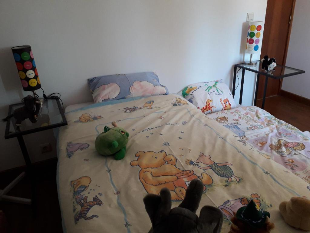 Postel nebo postele na pokoji v ubytování Casa da Farmácia