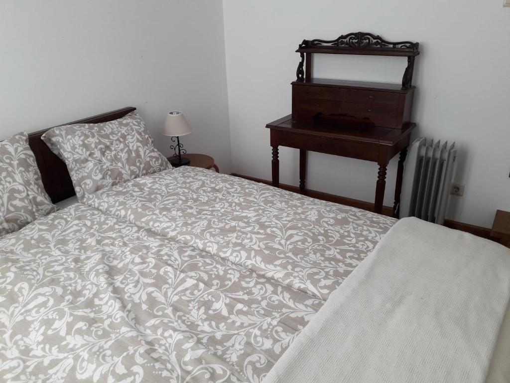Postel nebo postele na pokoji v ubytování Casa da Farmácia