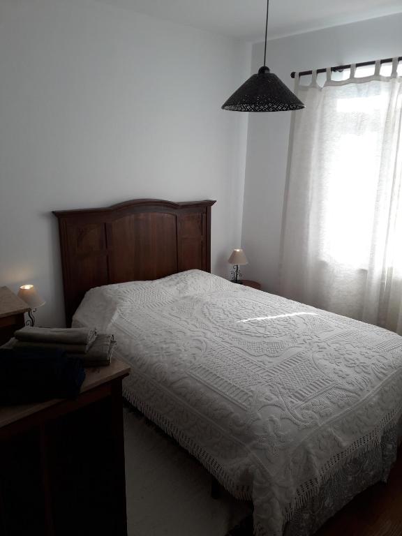 Postel nebo postele na pokoji v ubytování Casa da Farmácia