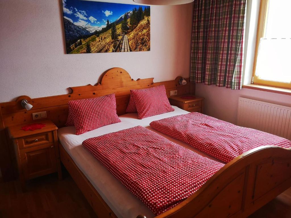 Ein Bett oder Betten in einem Zimmer der Unterkunft Apart Lorenz