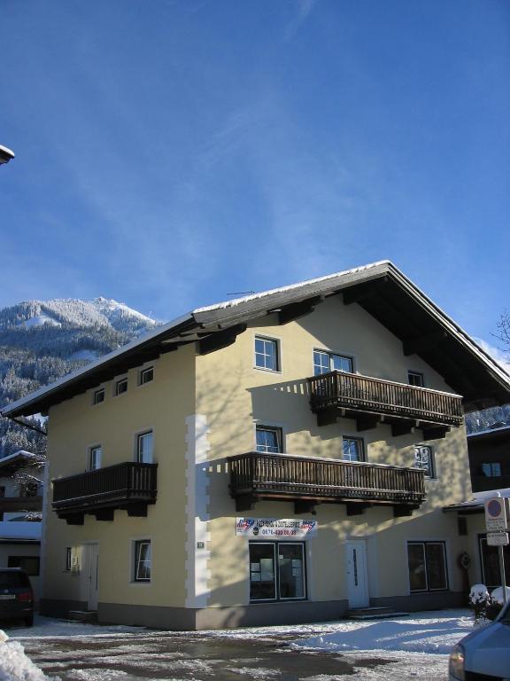 a large building with balconies on the side of it at Apartment Gossner in Westendorf