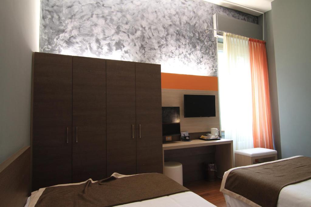 Telewizja i/lub zestaw kina domowego w obiekcie Hotel Metrò