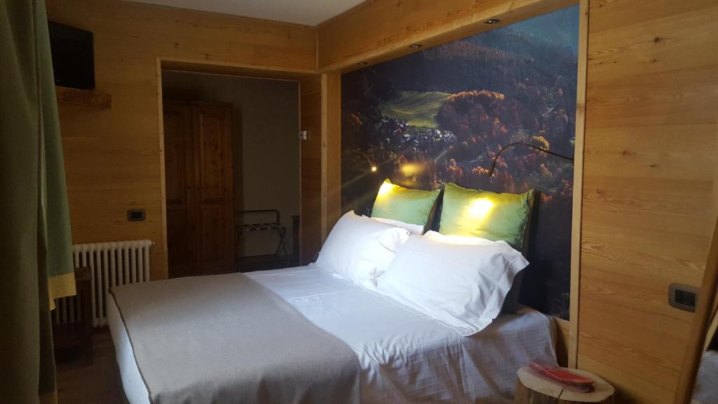 Postel nebo postele na pokoji v ubytování Hotel Castor