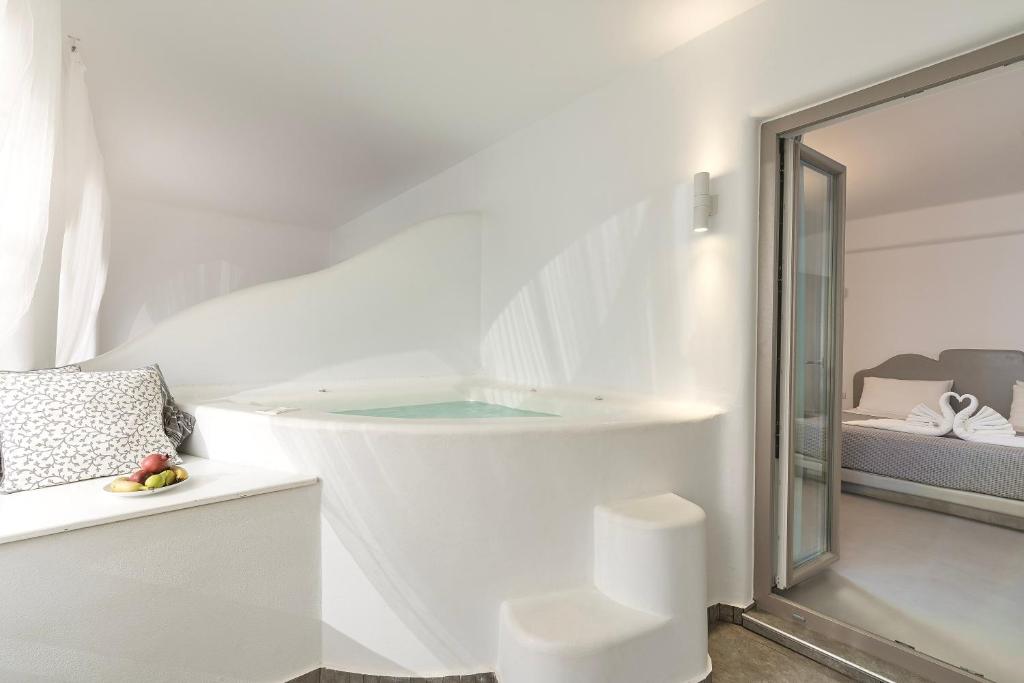 Postel nebo postele na pokoji v ubytování La Bellezza Eco Boutique Hotel