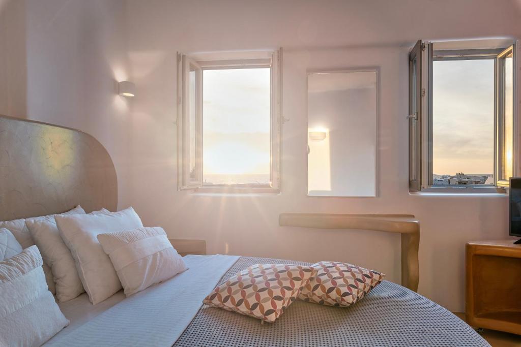Postel nebo postele na pokoji v ubytování La Bellezza Eco Boutique Hotel