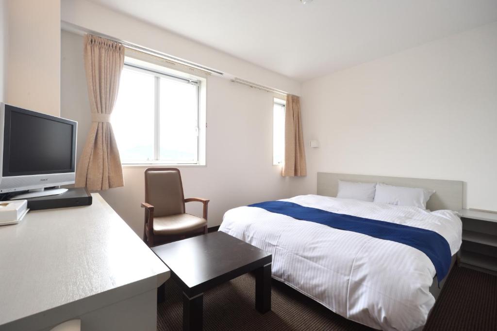 TV a/nebo společenská místnost v ubytování Uwajima Oriental Hotel
