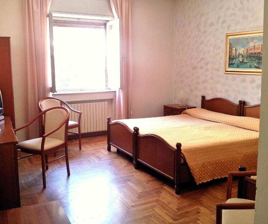 Postel nebo postele na pokoji v ubytování San Gabriele