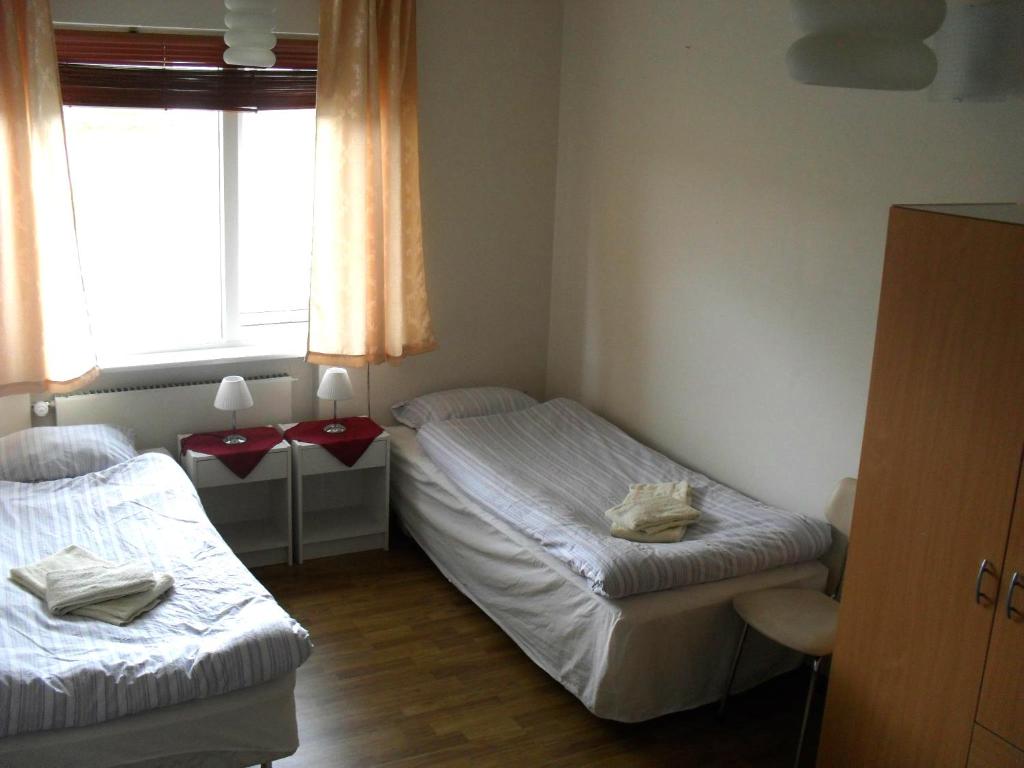 Postel nebo postele na pokoji v ubytování Kidagil Guesthouse