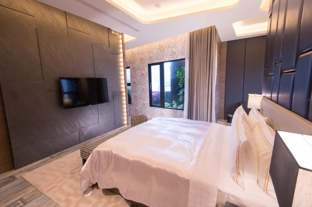 Postel nebo postele na pokoji v ubytování J Moon Villa Motel