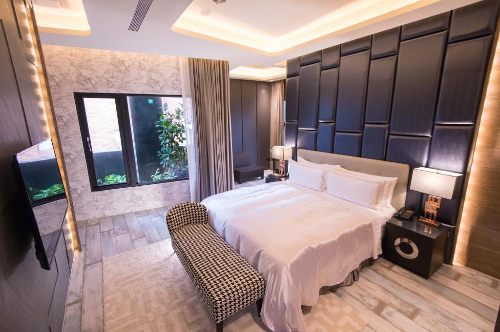 Postel nebo postele na pokoji v ubytování J Moon Villa Motel