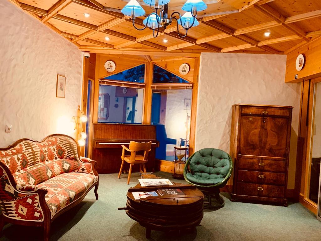 Posezení v ubytování Hôtel Ecureuil Villars