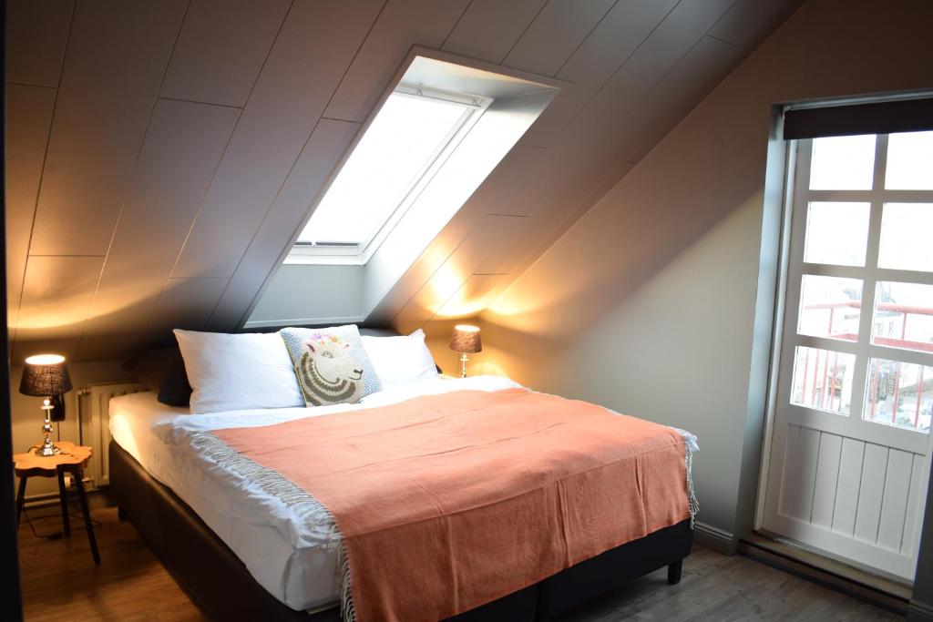Postel nebo postele na pokoji v ubytování Hotel Leifur Eiriksson