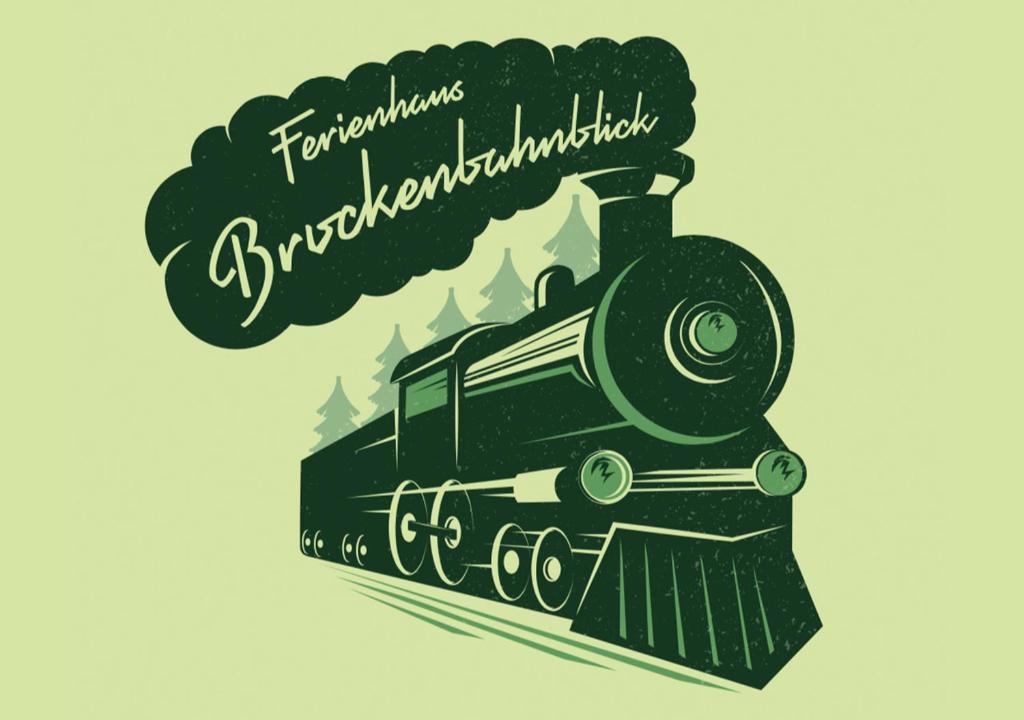 a drawing of a steam locomotive with a tree at Ferienhaus Brockenbahnblick in Wernigerode