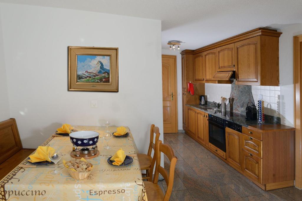 Kuchyň nebo kuchyňský kout v ubytování Apartment Aura