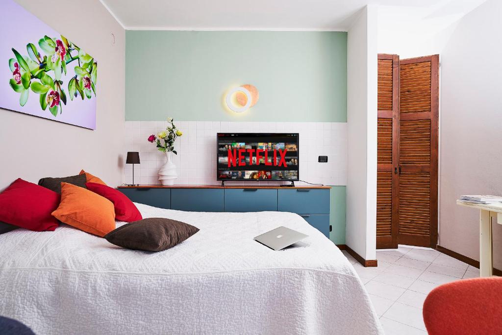 Een bed of bedden in een kamer bij Le Quattro Stagioni Lakeview
