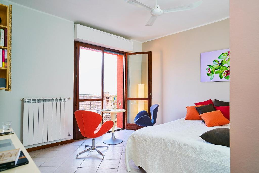 Een bed of bedden in een kamer bij Le Quattro Stagioni Lakeview