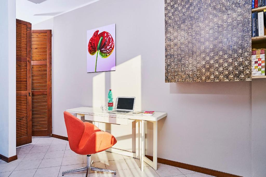 Een TV en/of entertainmentcenter bij Le Quattro Stagioni Lakeview
